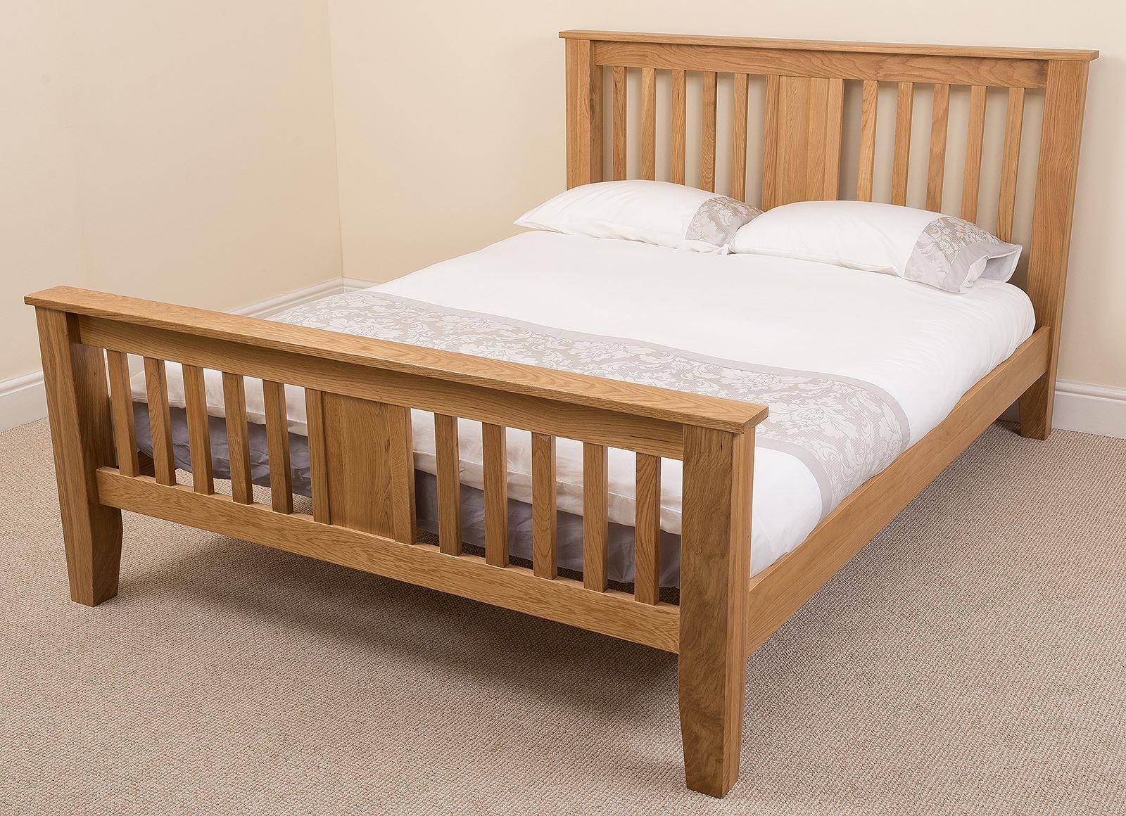 wooden double bed frame and mattress